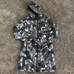 North Face long puffer jacket with hood.
